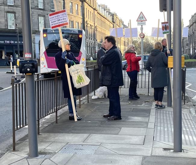 Protestors in E London St