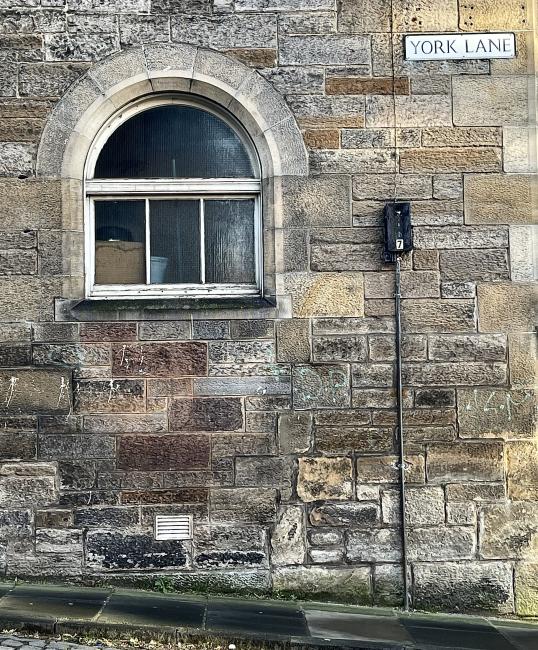 Wall and window on a slope.